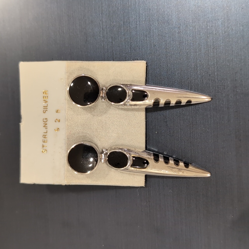 Sterling silver and Onex earrings.